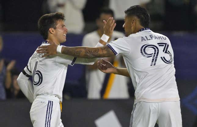 Aug 26, 2023; Carson, California, USA; Los Angeles Galaxy midfielder Riqui Puig (6) is congratulated by defender Tony Alfaro (93) after he scored a goal in the second half against the Chicago Fire at Dignity Health Sports Park.