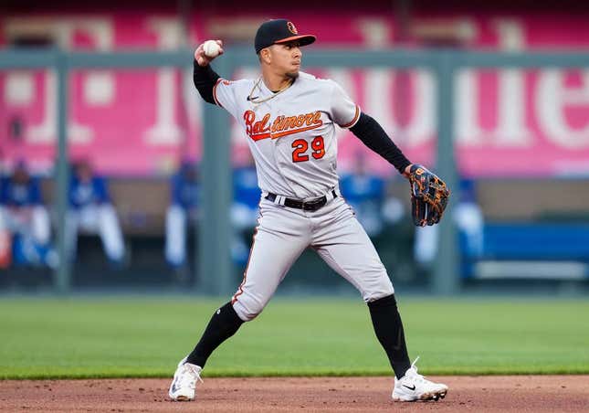 May 2, 2023; Kansas City, MO, USA; Baltimore Orioles third baseman Ramon Urias (29) throws the ball to one during the second inning against the Kansas City Royals at Kaufman Stadium base.