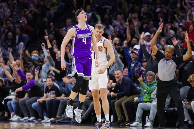 Mar 24, 2023; Sacramento, California, USA; Sacramento Kings guard Kevin Huerter (9) celebrates after a basket during the third quarter against the Phoenix Suns at Golden 1 Center.