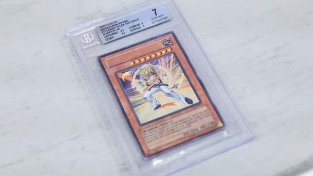 Tyler the Great Warrior card shown in its case.