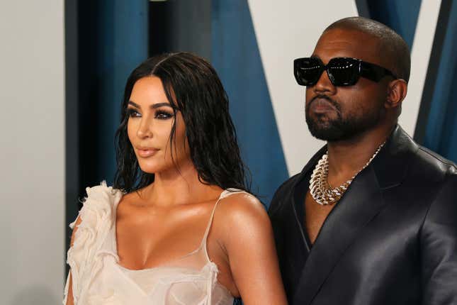 US media personality Kim Kardashian (L) and husband US rapper Kanye West attend the 2020 Vanity Fair Oscar Party following the 92nd Oscars at The Wallis Annenberg Center for the Performing Arts in Beverly Hills on February 9, 2020. 
