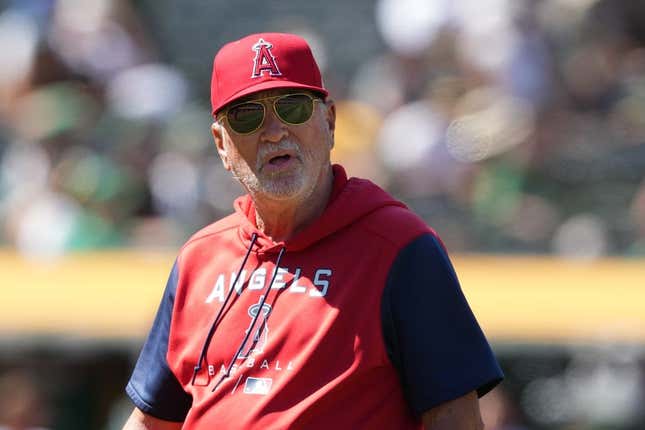 May 14, 2022; Oakland, California, USA; Los Angeles Angels manager Joe Maddon (70) walks to the dugout during the seventh inning against the Oakland Athletics at RingCentral Coliseum.