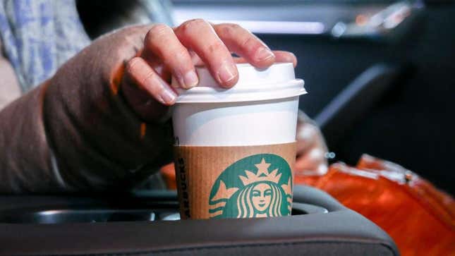 coffee cup in car cupholder
