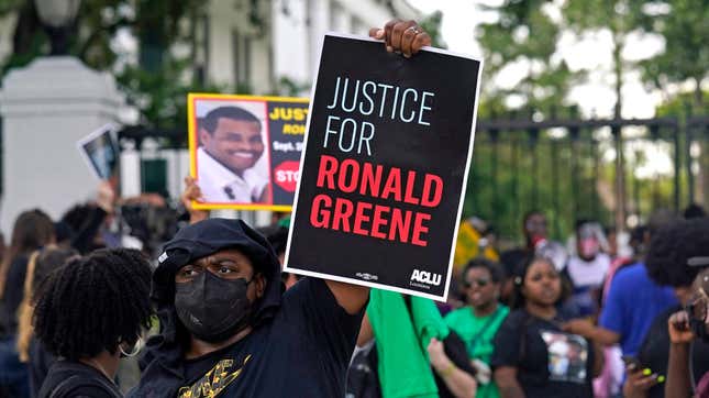 In this Thursday, May 27, 2021, file photo, demonstrators stand in front of the governor’s mansion after a march from the state Capitol in Baton Rouge, La., protesting the death of Ronald Greene, who died in the custody of Louisiana State Police in 2019. A reexamined autopsy ordered up by the FBI in the deadly arrest of Greene has rejected the Louisiana State Police claim that a car crash caused his fatal injuries, narrowing prosecutors’ focus on the troopers seen on body camera video beating, stunning and dragging him. 