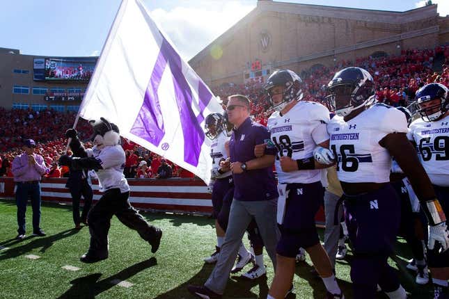 Northwestern head coach Pat Fitzgerald leads him team onto the field after the national anthem before their game against Wisconsin Saturday, September 30, 2017 at Camp Randall Stadium in Madison, Wis. Wisconsin beat Northwestern 33-24.MARK HOFFMAN/MILWAUKEE JOURNAL SENTINEL (Via OlyDrop)