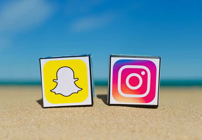 Snapchat and Instagram logos on beach
