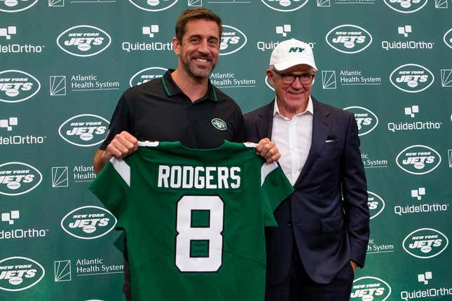 Apr 26, 2023; Florham Park, NJ, USA; New York Jets quarterback Aaron Rodgers (left) and owner Woody Johnson pose for a photo during the introductory press conference at Atlantic Health Jets Training Center.