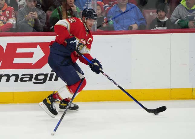 Mar 16, 2023; Sunrise, Florida, USA; Florida Panthers center Aleksander Barkov (16) skates up the ice while  tangled up with a stick in the second period during the game against the Montreal Canadiens at FLA Live Arena.