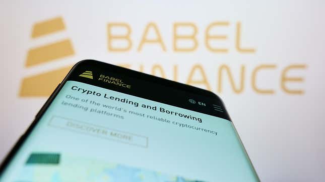 Mobile phone with website of crypto company Babel Finance on screen in front of business logo