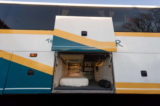 Image for article titled This Beautiful Coach Bus RV Has A Basement Bedroom And A Full Kitchen