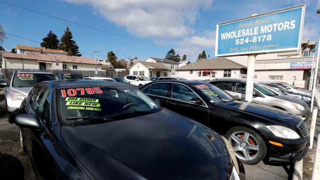 Used cars sit on the sales lot at Frank Bent’s Wholesale Motors on March 15, 2021 in El Cerrito, California. 