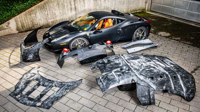 A photo of the Ferrari mule car with all its coverings on the side.