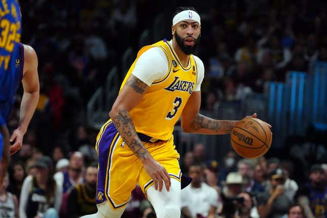 May 16, 2023; Denver, Colorado, USA; Los Angeles Lakers forward Anthony Davis (3) controls the ball against the Denver Nuggets in the third quarter during game one of the Western Conference Finals for the 2023 NBA playoffs at Ball Arena.