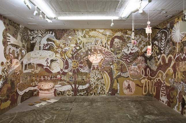 Image for article titled Japanese artists create stunning mud paintings on this Indian school’s walls—then wipe them off