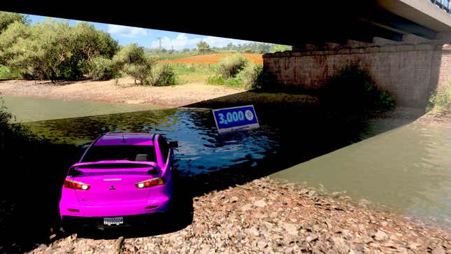 A Mitsubishi Lancer drives on a riverbank next to a bonus board in Forza Horizon 5.