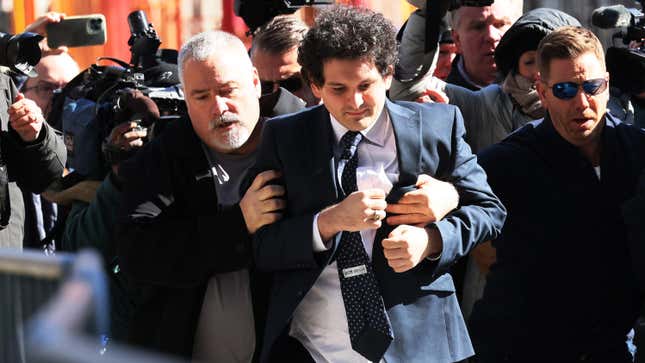 FTX Founder Sam Bankman-Fried arrives at Manhattan Federal Court for a court appearance on March 30, 2023 in New York City. A revised indictment was filed in federal court accusing Bankman-Fried of paying a $40 million bribe to one or more Chinese government officials. He has already been charged with eight criminal counts of fraud, conspiracy, and money-laundering offenses which include making illegal political contributions. 