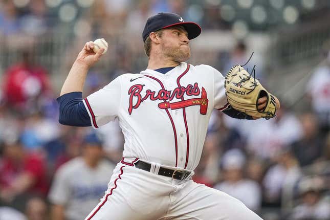 May 24, 2023; Cumberland, Georgia, USA; Atlanta Braves starting pitcher Bryce Elder (55) pitches against the Los Angeles Dodgers during the first inning at Truist Park.