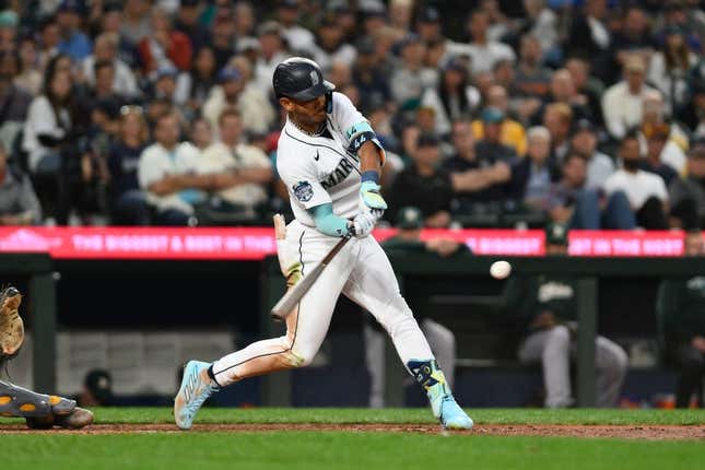 Aug 28, 2023; Seattle, Washington, USA; Seattle Mariners center fielder Julio Rodriguez (44) hits a 2-run home run against the Oakland Athletics during the third inning at T-Mobile Park.