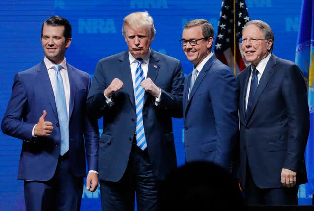 Don Jr, Donald Trump, and the NRA’s Chris Cox and Wayne LaPierre at the NRA convention in 2018.