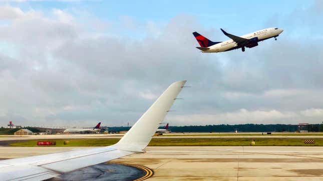 A Delta Airlines airplane takes off from Atlanta International Airport, Georgia. 