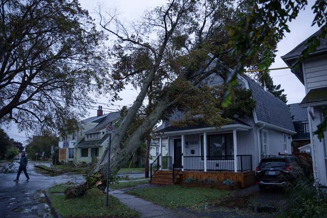 A tree collapsed onto a home in Halifax, Nova Scotia on Saturday, September 24.