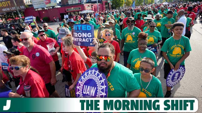 United Auto Workers members walk in the Labor Day parade in Detroit on Sept. 4, 2023. The union is threatening to strike any automaker that hasn't reached an agreement by the time contracts expire on Sept. 14.