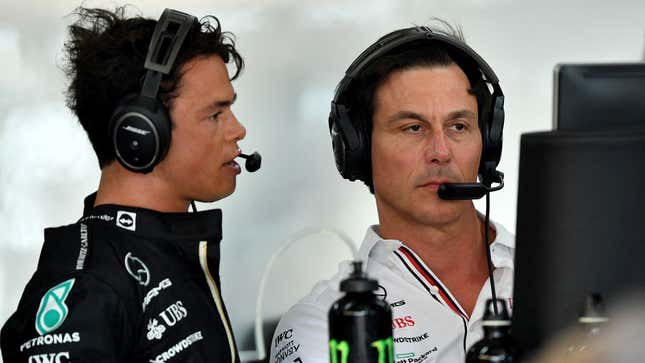 Mercedes Formula E and reserve Formula 1 driver Nyck de Vries, left, speaks with Mercedes F1 team principal Toto Wolff during a practice session on July 22 ahead of the French Grand Prix.