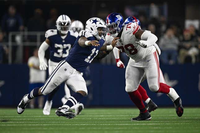 Nov 24, 2022; Arlington, Texas, USA; Dallas Cowboys linebacker Micah Parsons (11) and New York Giants offensive tackle Andrew Thomas (78) in action during the game between the Dallas Cowboys and the New York Giants at AT&T Stadium.