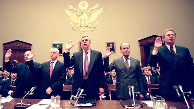 Five tobacco industry executives are sworn in before testifying in front of the US House Commerce Committee on Capitol Hill in Washington, DC. on January 29, 1998.