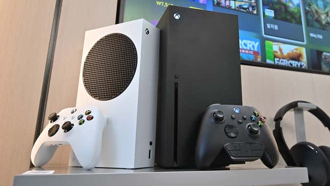An Xbox Series S and X stand on a table.
