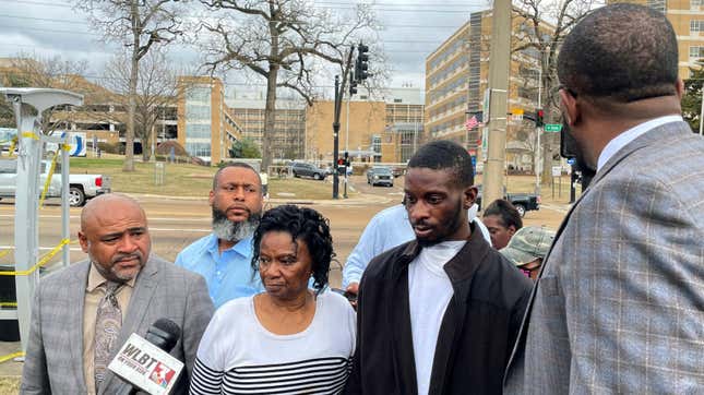 Michael Jenkins, second from right, stand with his mother, Mary Jenkins, center, and their attorneys at a news conference Wednesday, Feb. 15. 2023, in Jackson, Miss., following his release from the hospital three weeks after being shot by sheriff’s deputies.