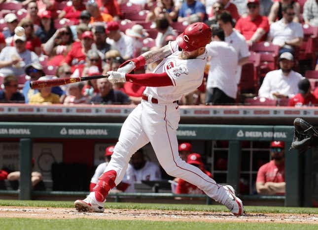 May 11, 2023; Cincinnati, Ohio, USA; Cincinnati Reds left fielder Jake Fraley (27) hits an RBI single against the New York Mets during the first inning at Great American Ball Park.