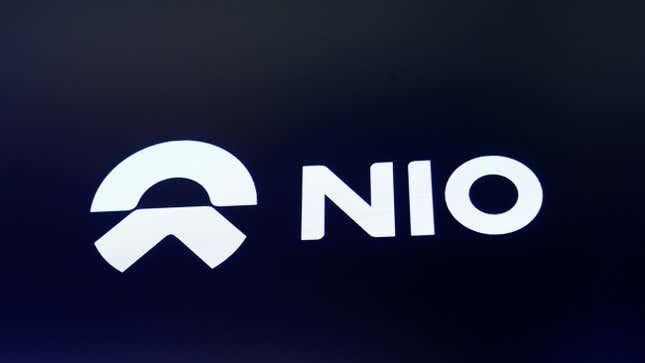 FILE PHOTO: Chinese electric vehicle start-up Nio Inc. company logo is on display on its initial public offering (IPO) day at the NYSE in New York, U.S., September 12, 2018. REUTERS/Brendan McDermid/File Photo