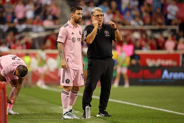 Aug 26, 2023; Harrison, New Jersey, USA; Inter Miami CF forward Lionel Messi (10) talks with head coach Gerardo Martino before being put into the game New York Red Bulls during the second half at Red Bull Arena.