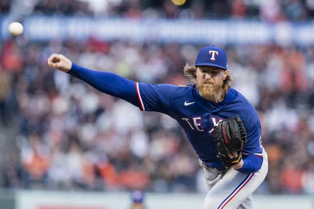 Aug 11, 2023; San Francisco, California, USA; Texas Rangers starting pitcher Jon Gray (22) throws against the San Francisco Giants during the first inning at Oracle Park.