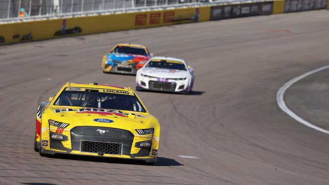 A photo of three Nascar racers on track in Las Vegas. 