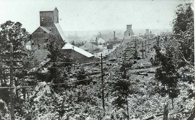 A view of Champion Mine outside Nevada City from Providence Mine, in 1910. Champion Mine is right across the creek from Providence Mine but not on the parcel of land owned by the town, so it’s outside the area that Sierra Streams Institute is able to clean up.