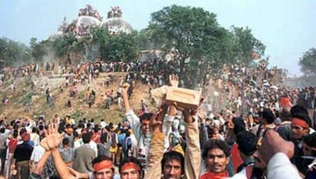 The Babri mosque being vandalised on Dec. 6, 1992.