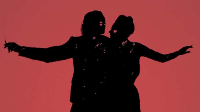 The Joker and Harley Quinn (we think) dance in silhouette.