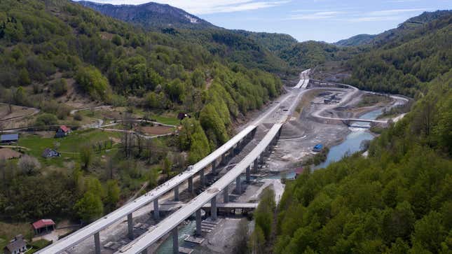 An aerial views shows a part of the new highway connecting the city of Bar on Montenegros Adriatic coast to landlocked neighbour Serbia, (Bar-Boljare highway) on May 11, 2021, near Matesevo, which is being constructed by China Road and Bridge Corporation (CRBC), the large state-owned Chinese company.