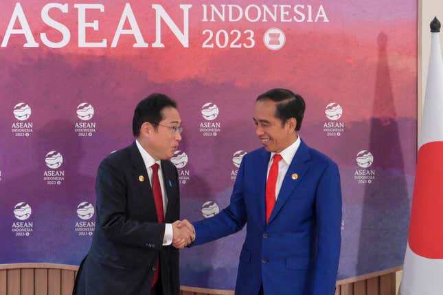 Indonesian President Joko Widodo, right, greets Japan&#39;s Prime Minster Fumio Kishida during their bilateral meeting on the sidelines of the Association of Southeast Asian Nations (ASEAN) Summit in Jakarta, Indonesia Thursday, Sept. 7, 2023. (Bay Ismoyo/Pool Photo via AP)