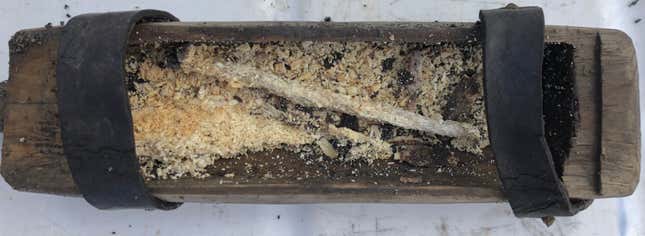 The opened box, with its beeswax contents inside.