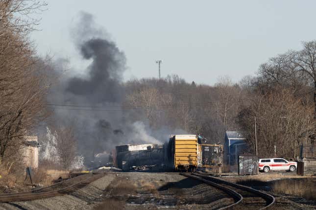 Smoke rises from a derailed cargo train in East Palestine, Ohio, on February 4, 2023. The train accident sparked a massive fire and evacuation orders.