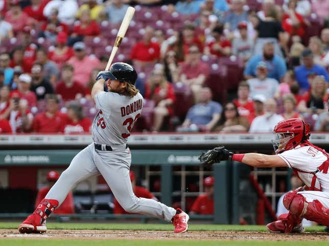 May 23, 2023; Cincinnati, Ohio, USA; St. Louis Cardinals first baseman Brendan Donovan (33) hits a single against the Cincinnati Reds during the second inning at Great American Ball Park.
