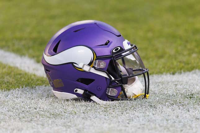 Jan 1, 2023; Green Bay, Wisconsin, USA;  A Minnesota Vikings helmet sits on the field during warmups prior to the game against the Green Bay Packers at Lambeau Field.
