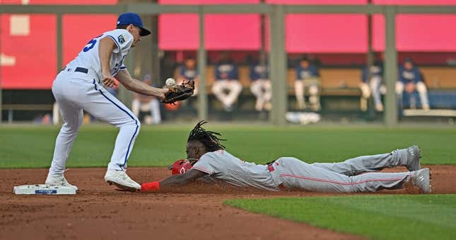 Jun 13, 2023; Kansas City, Missouri, USA; Cincinnati Reds shortstop Elly De La Cruz (44) steals second base against Kansas City Royals second baseman Matt Duffy (15) in the first inning at Kauffman Stadium.