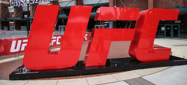 A UFC logo stands outside the arena, April 24, 2021, in Jacksonville, Fla. Shares of TKO Group, the new company that houses WWE and UFC, opened at $102 per share in their first day of trading on the New York Stock Exchange on Tuesday, Sept. 12, 2023. Endeavor Group Holdings Inc. has closed its previously announced deal with World Wrestling Entertainment Inc. The pairing of WWE with the company that runs Ultimate Fighting Championship creates a $21.4 billion sports entertainment company. (AP Photo/Gary McCullough, file)