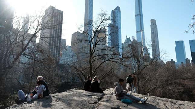 People enjoy an afternoon in Central Park in Manhattan on an unseasonably warm afternoon on February 15, 2023 in New York City. The city has seen almost no snow this winter. 