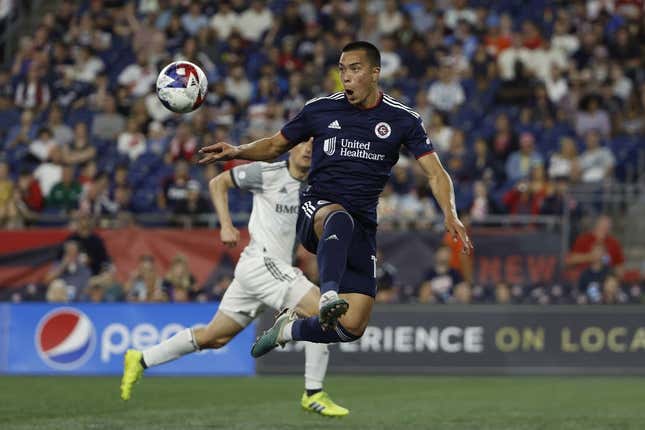 Jun 24, 2023; Foxborough, Massachusetts, USA; New England Revolution forward Bobby Wood (17) goes up to control the ball against the Toronto FC during the second half at Gillette Stadium.