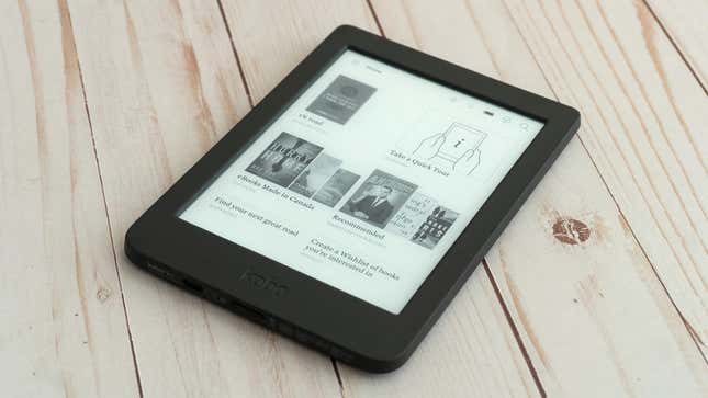 The Kobo Nia e-reader sitting on a wooden table.
